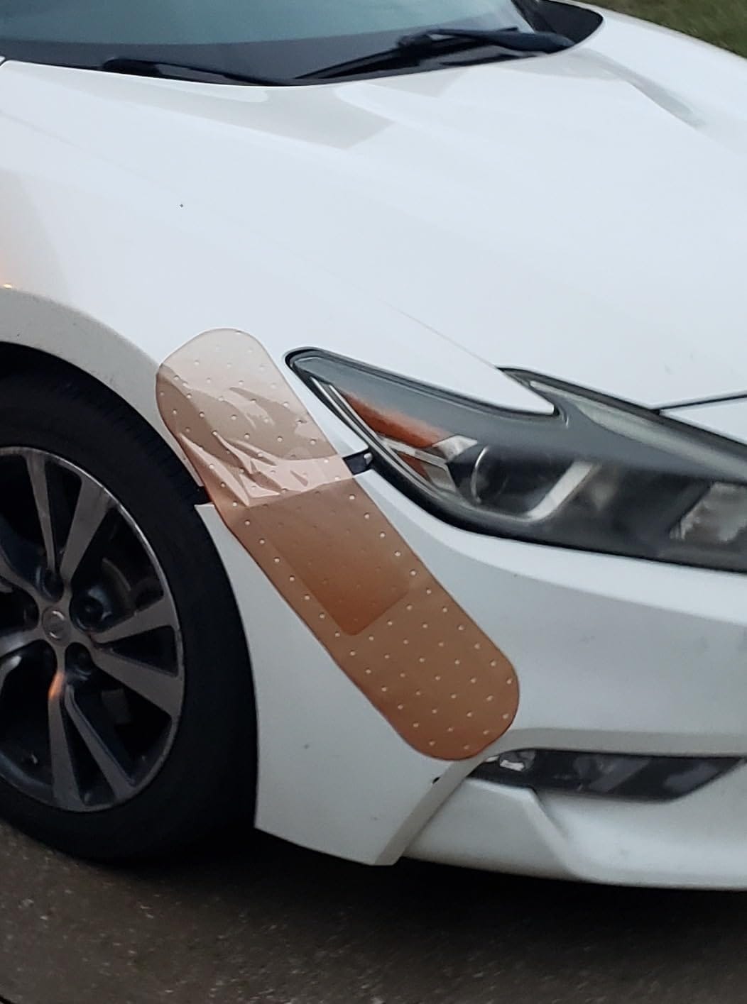 Giant Car Bandaid Sticker: The Funniest Fix for Scratches?